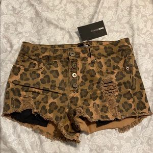 Fashion Nova leopard print distressed denim shorts